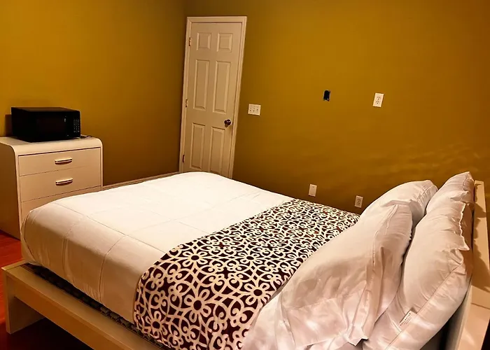 Spotless Guest Room With Shared Bathroom
